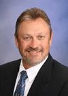 Michael W. Woodall    President